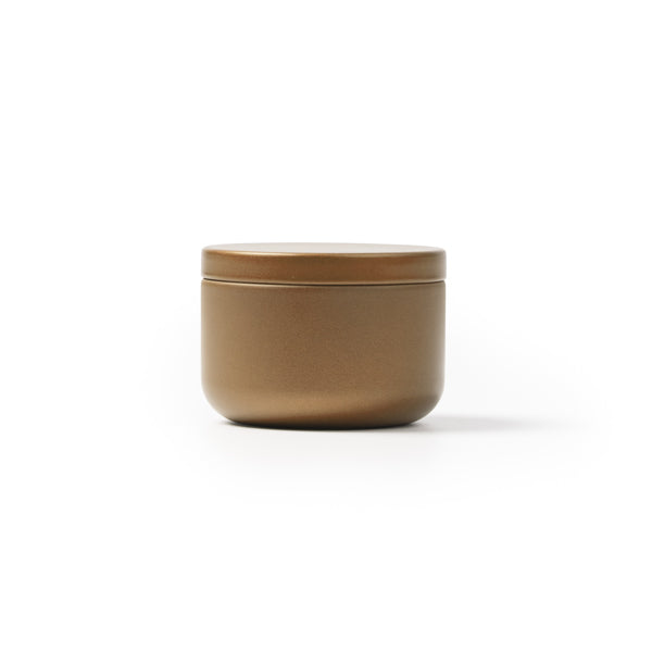 Stamina Gento a round metal candle in gold, ready for laser engraving