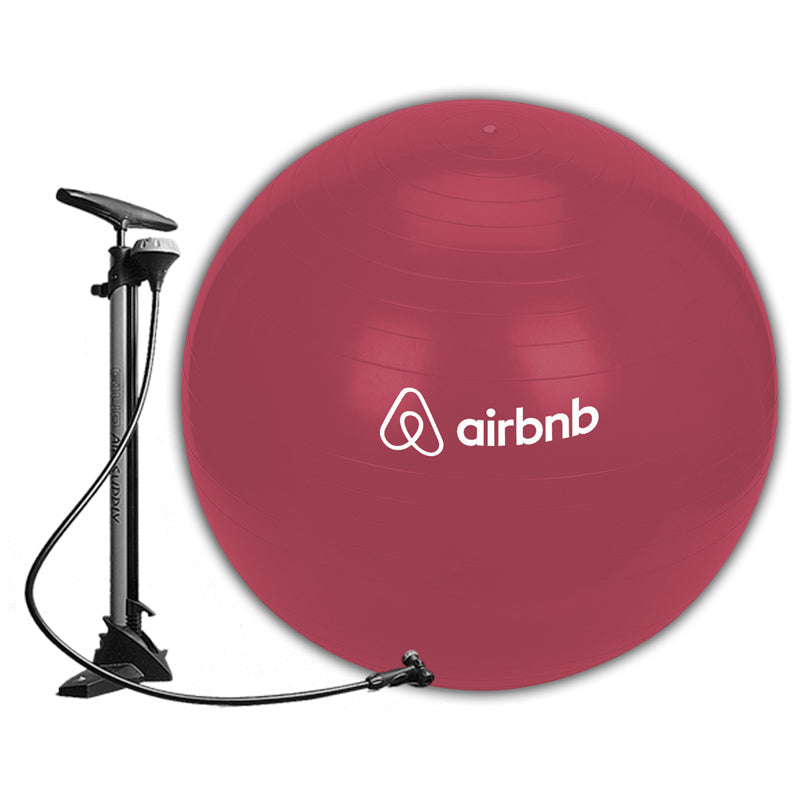 Red PVC fitness ball with a printed logo and a hand pump