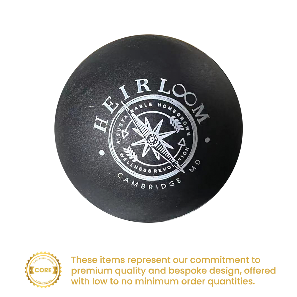 Black rubber lacrosse ball with a debossed circular logo